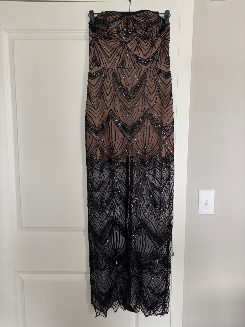 Very similar to Bronx and Banco Black Beaded Nude Illusion Strapless Prom Dress-